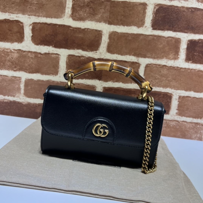 G*u*i top handle bags